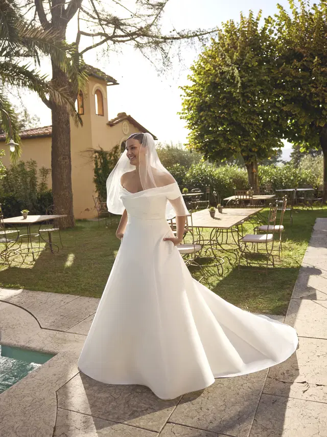 Jolie by Modeca Bridal: Ball Gown silhouette, off-shoulder neckline, mikado, chapel train