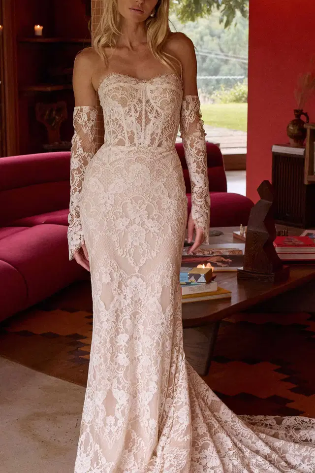 Winnie by MWL Bride: Trumpet silhouette, sweetheart neckline, long sleeves, lace