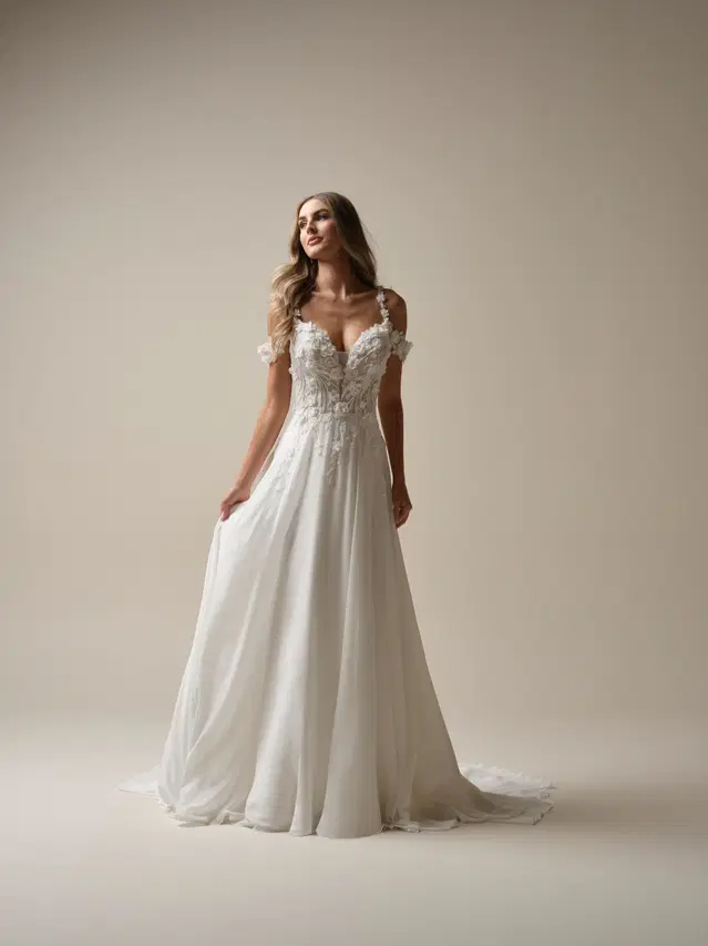 Hunter by Maggie Sottero: Straight silhouette, deep V-neck neckline, chiffon, chapel train