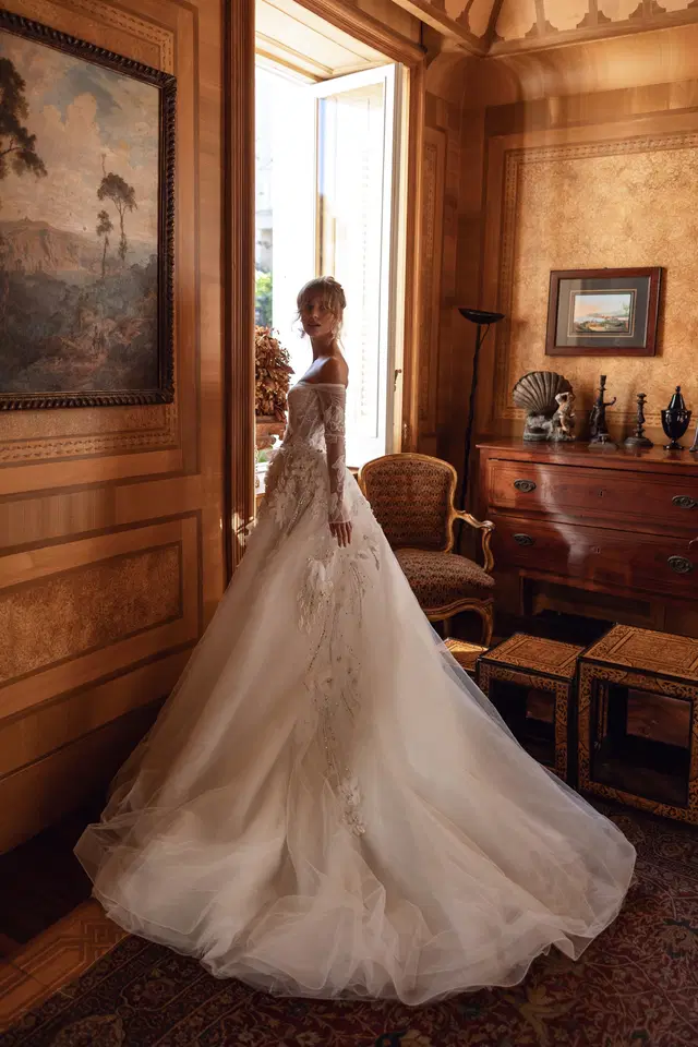Odette by Tina Valerdi: Ball Gown silhouette, sweetheart neckline, long sleeves, tulle
