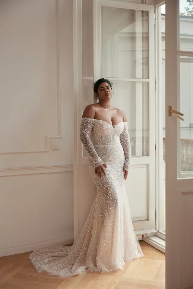Safari by Wona Concept: Mermaid silhouette, sweetheart neckline, long sleeves, lace