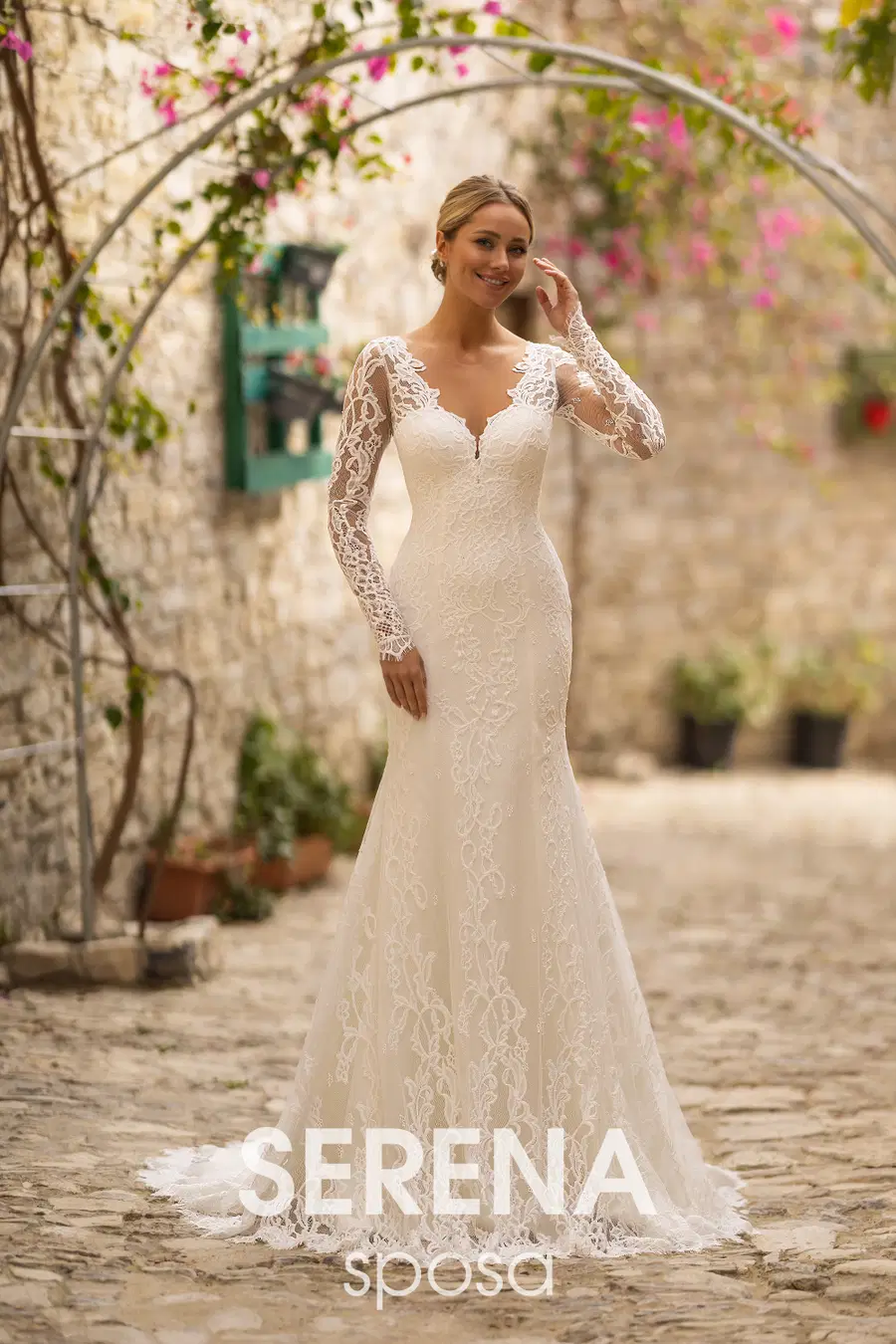 5551 by Serena Bridal: Fit & Flare silhouette, V-neck neckline, long sleeves, lace
