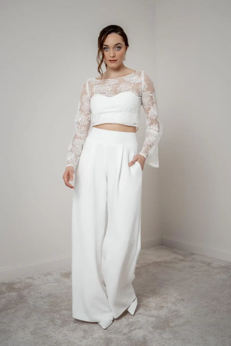 Top Safi by noni Selected: Two-Piece silhouette, boat neck neckline, long sleeves, lace