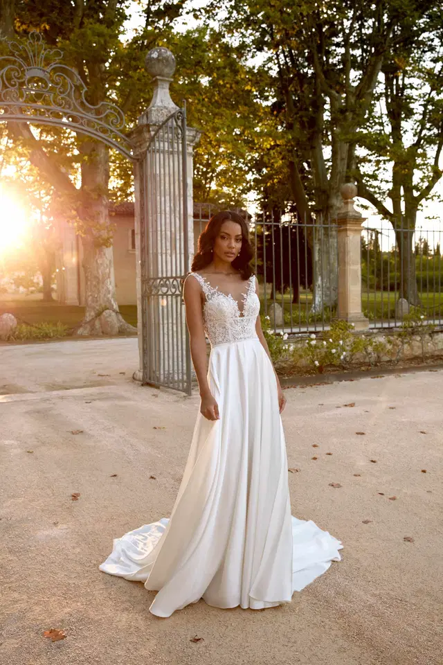 44595 by Sincerity Bridal: A-Line silhouette, deep V-neck neckline, sleeveless, lace