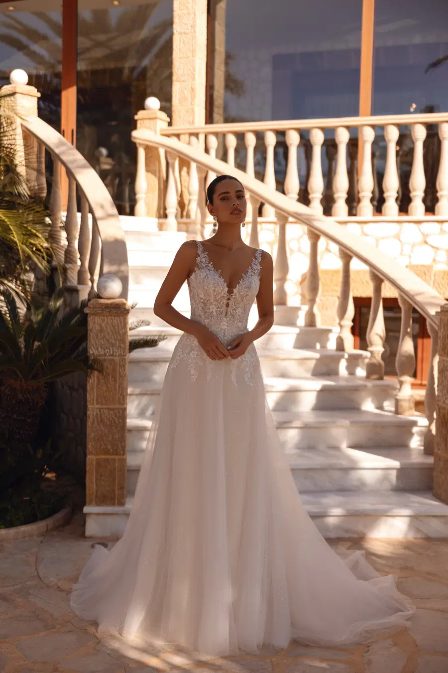 8277 by Demetrios: A-Line silhouette, deep V-neck neckline, sleeveless, lace