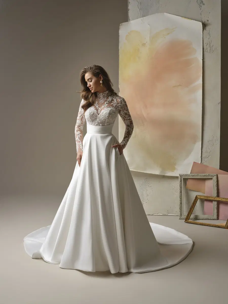 Trinity by Maggie Sottero: A-Line silhouette, high / halter neckline, long sleeves, lace