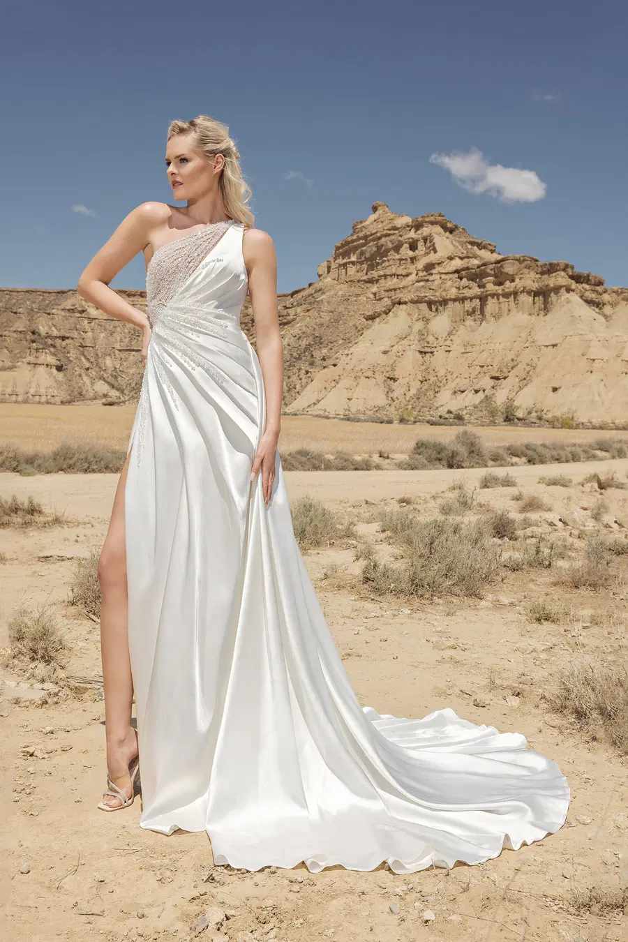 DT119 by Duett: Ball Gown silhouette, asymetric neckline, sleeveless, satin