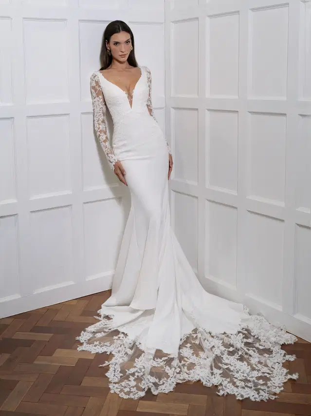 Cortina by Avenue by Josephine Scott: Trumpet silhouette, deep V-neck neckline, long sleeves, lace