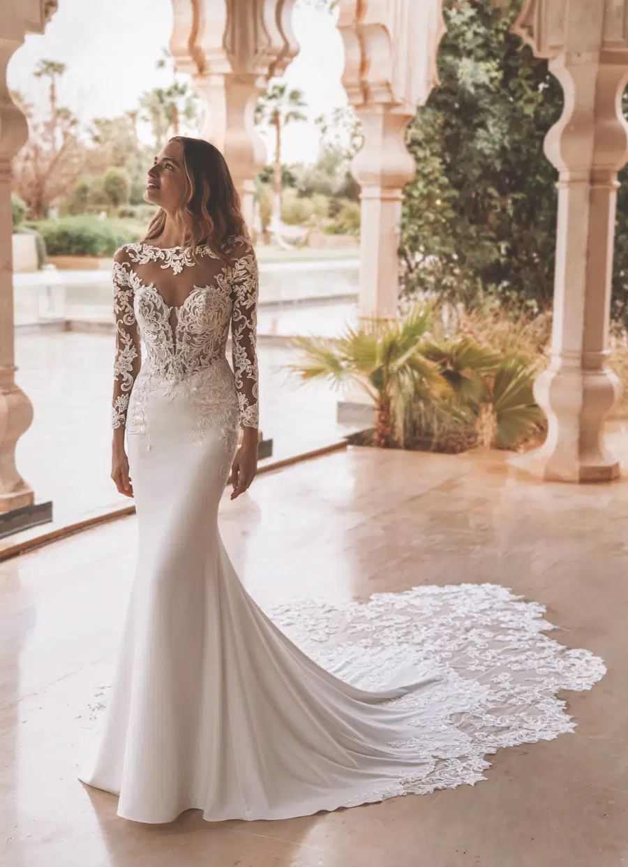 Vienna by Enzoani: Fit & Flare silhouette, illusion neckline, long sleeves, lace