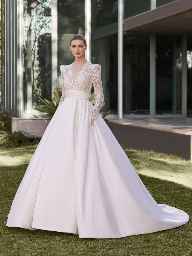 MASSY by Pronovias: Princess silhouette, V-neck neckline, long sleeves, lace