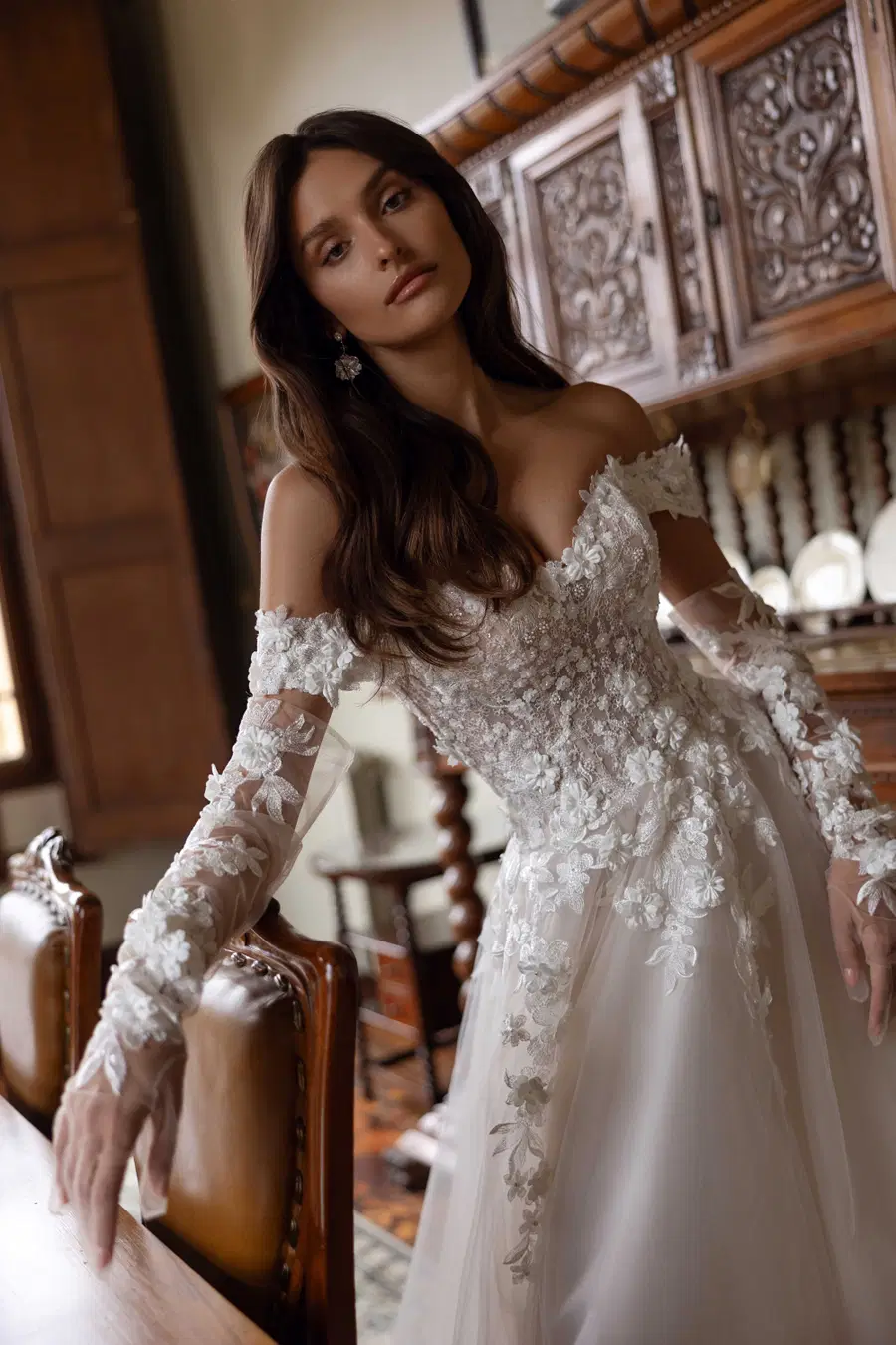 Freesia by Tina Valerdi: Ball Gown silhouette, off-shoulder neckline, long sleeves, tulle