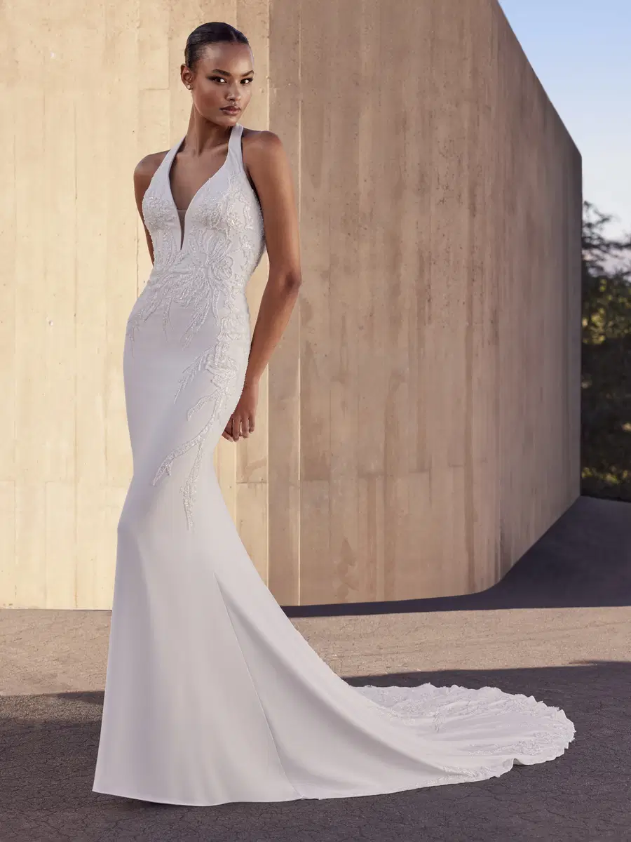 BREBI by Pronovias: Mermaid silhouette, high / halter neckline, sleeveless, stretch satin