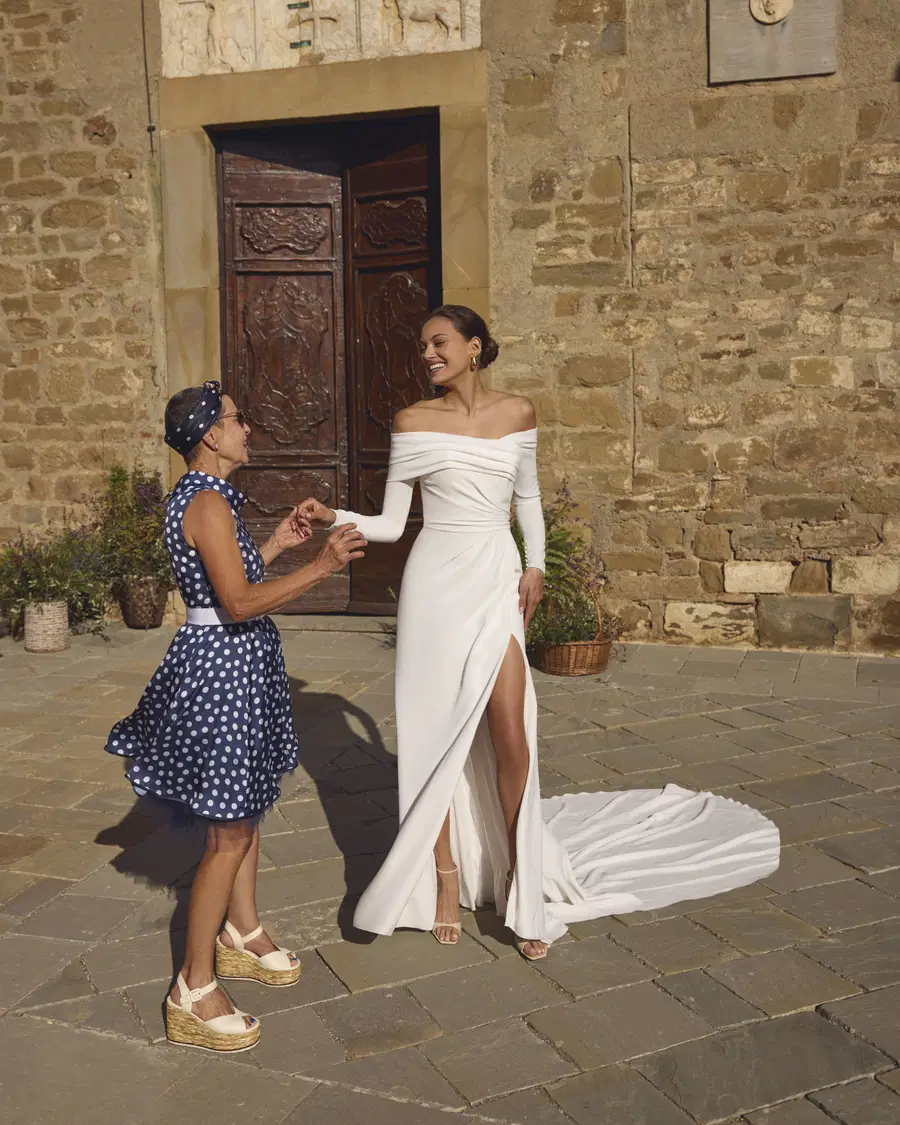 Giselle by Modeca Bridal: Fit & Flare silhouette, off-shoulder neckline, long sleeves, crepe