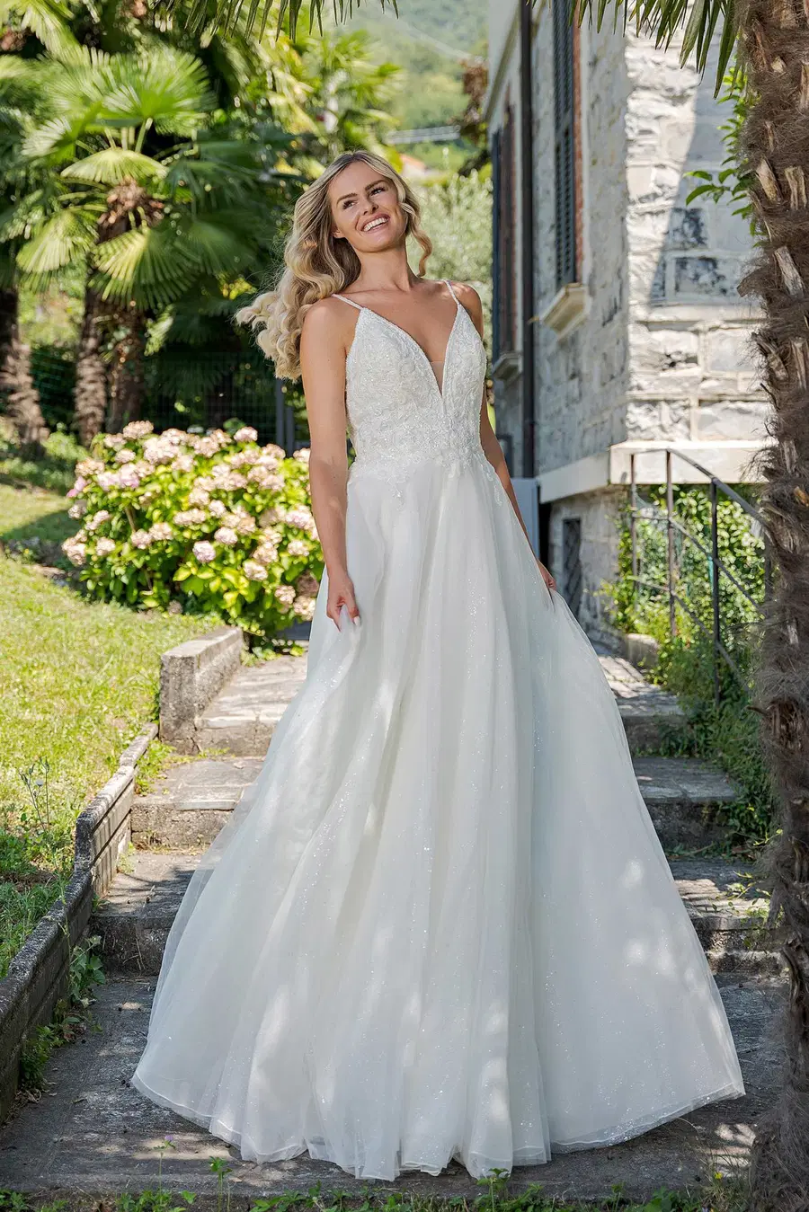 VN10 ivory by Vera Nova: A-Line silhouette, V-neck neckline, tulle, cathedral train