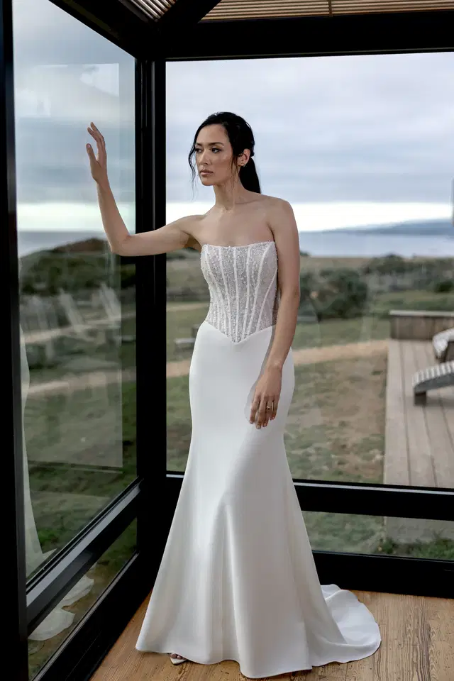 Esmarie by Adore: Fit & Flare silhouette, cat eye neckline, crepe