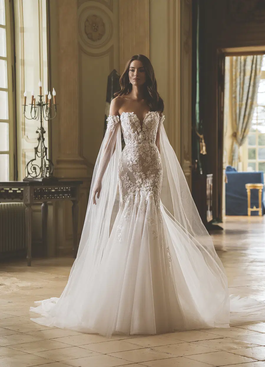 Gretchen by ÉLYSÉE: Fit & Flare silhouette, sweetheart neckline, lace, chapel train
