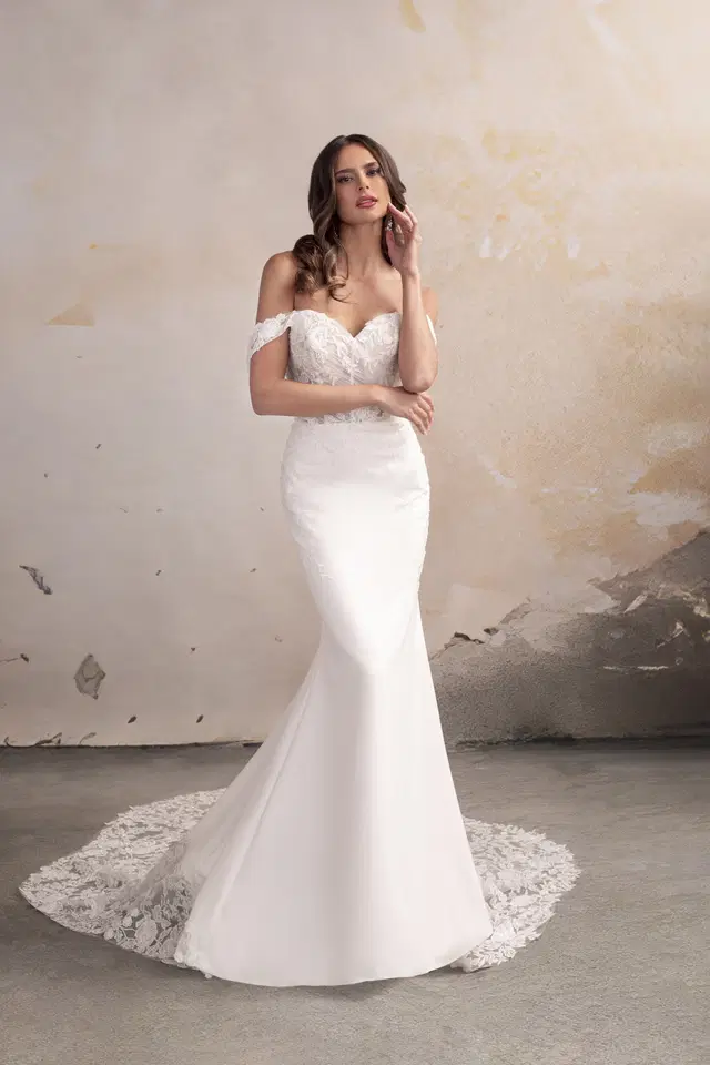 Sylvie by Donna Salado Couture: Fit & Flare silhouette, sweetheart neckline, short sleeves, crepe