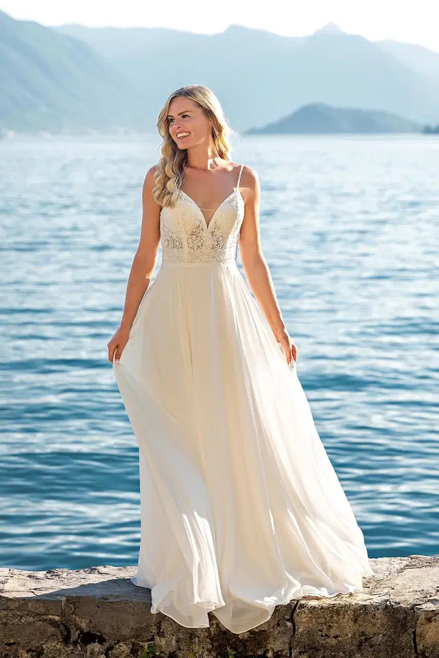 VN16 ivory by Vera Nova: A-Line silhouette, sweep / brush train