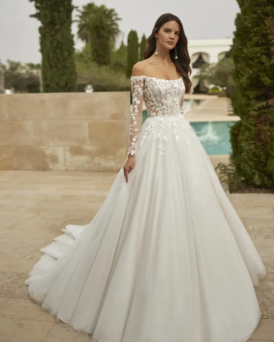 Silvana by Adriana Alier: Ball Gown silhouette, off-shoulder neckline, long sleeves, tulle