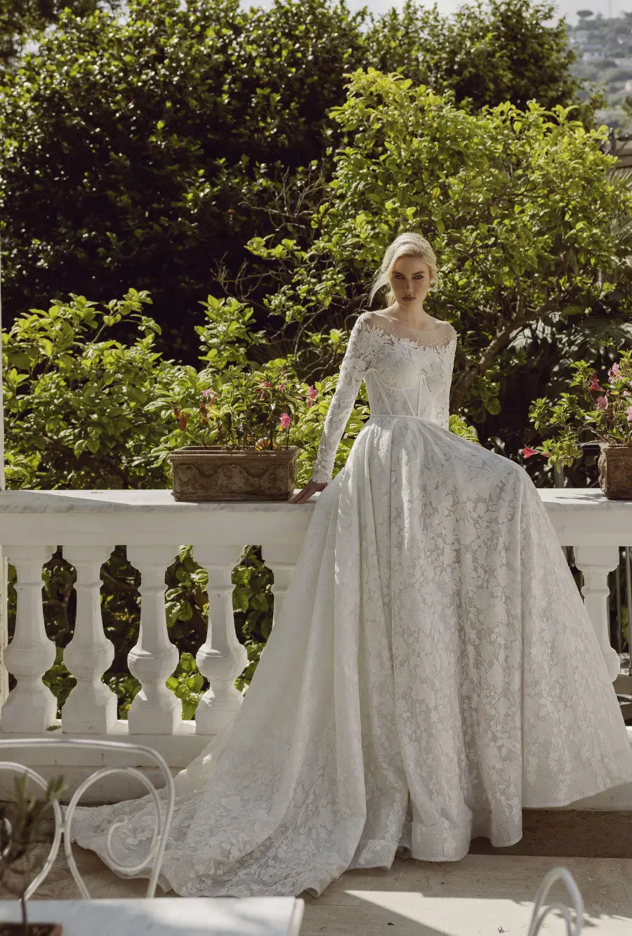 Emilia 24-010 by Ricca Sposa: Ball Gown silhouette, illusion neckline, long sleeves, lace