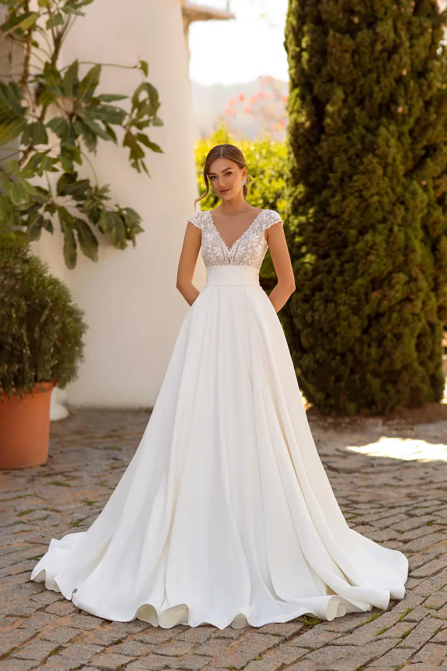 8239 by Monica Loretti: A-Line silhouette, V-neck neckline, cap sleeves, lace