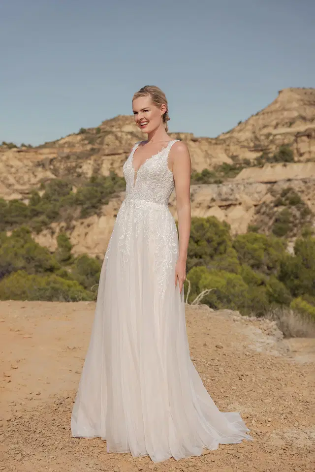 DT316 by Duett: A-Line silhouette, deep V-neck neckline, sleeveless, tulle