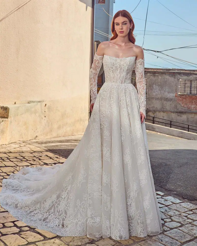 LA25101 Aretha by Calla Blanche: A-Line silhouette, off-shoulder neckline, long sleeves, lace
