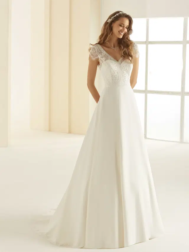 NATALIE by Bianco Evento: A-Line silhouette, V-neck neckline, cap sleeves, lace