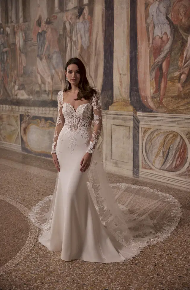 Anicca 63356 by Veni Infantino: Trumpet silhouette, sweetheart neckline, long sleeves, lace