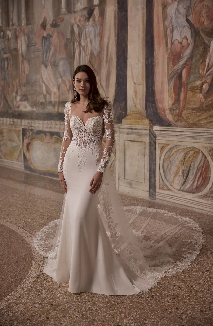 Anicca 63356 by Veni Infantino: Trumpet silhouette, sweetheart neckline, long sleeves, lace
