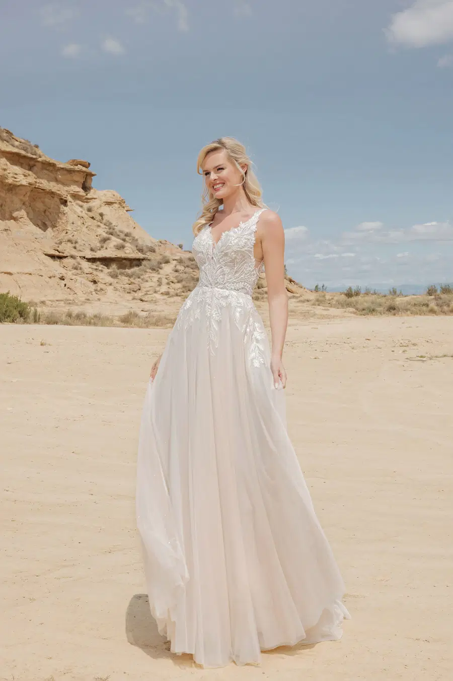 DT312 by Duett: A-Line silhouette, V-neck neckline, sleeveless, tulle