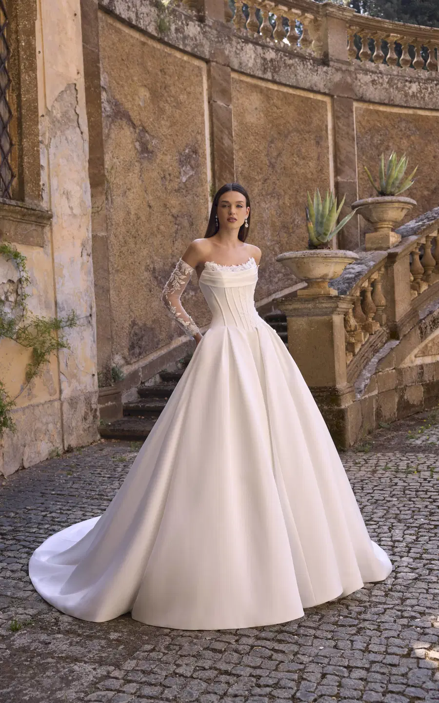 Annie 63228 by Veni Infantino: Ball Gown silhouette, sweetheart neckline, long sleeves, satin