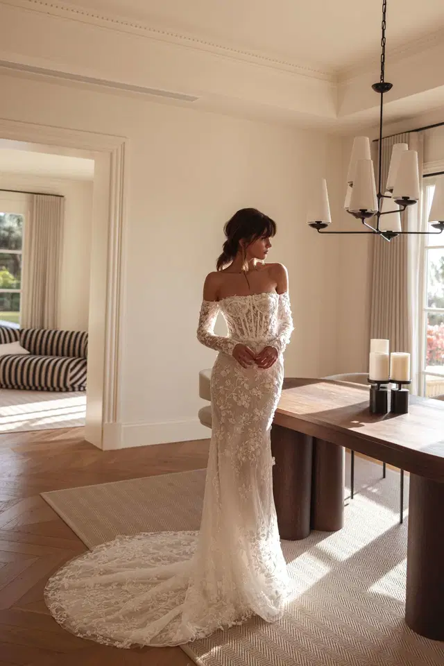 Katy by Tina Valerdi: Mermaid silhouette, off-shoulder neckline, long sleeves, lace