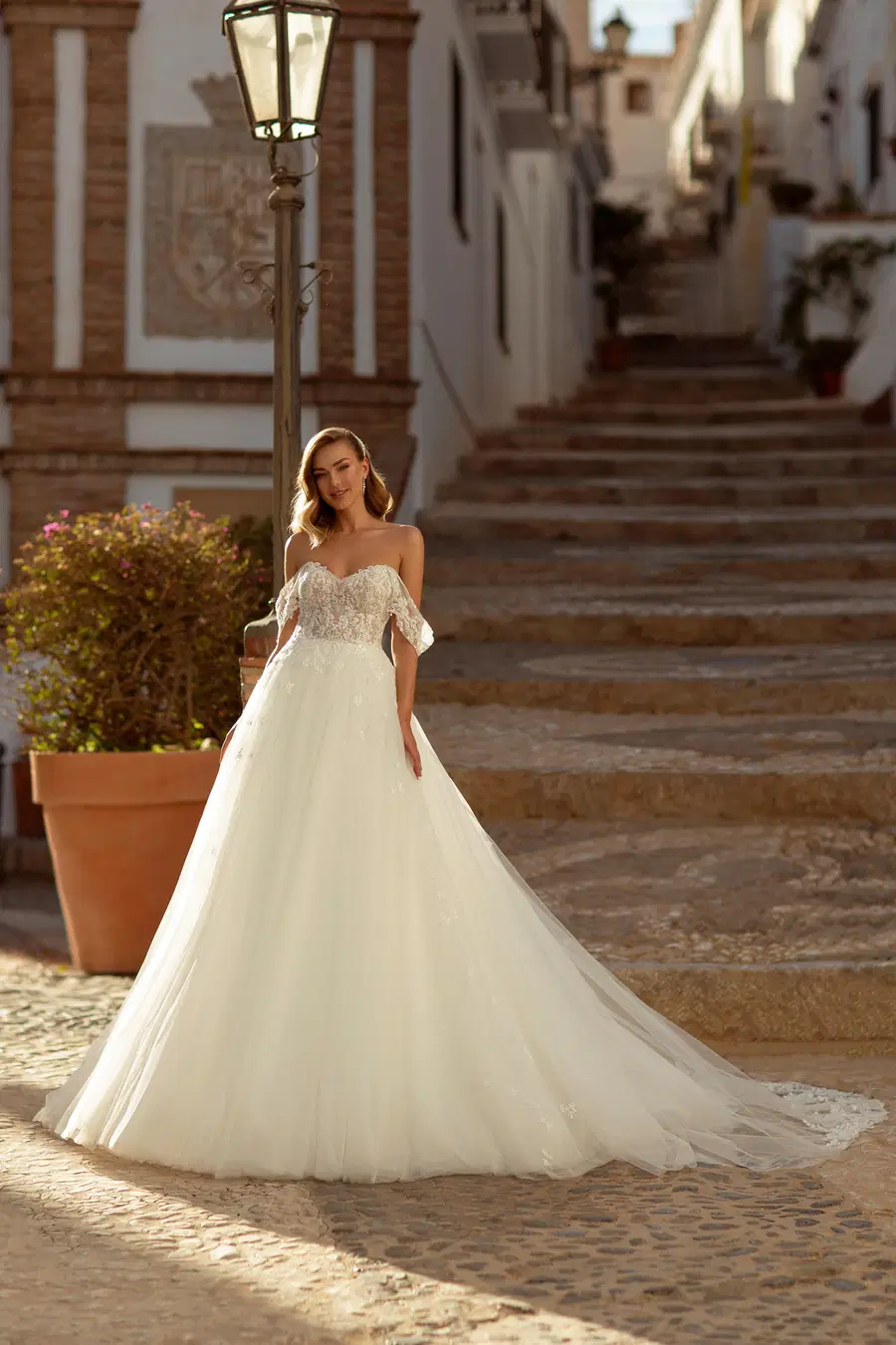 8252 by Monica Loretti: A-Line silhouette, sweetheart neckline, short sleeves, lace
