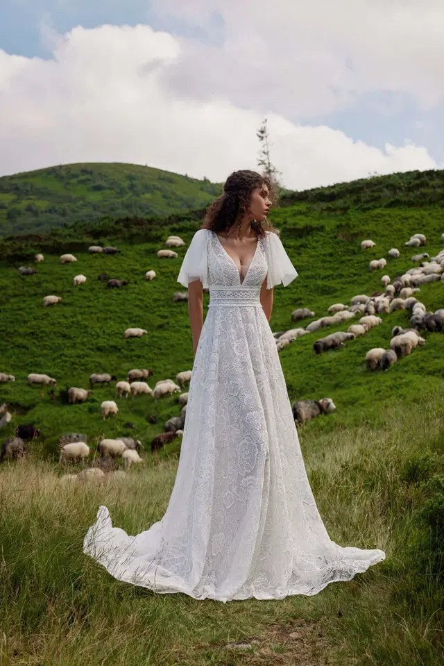 Bernadette by Ariamo Boho: A-Line silhouette, deep V-neck neckline, short sleeves, lace