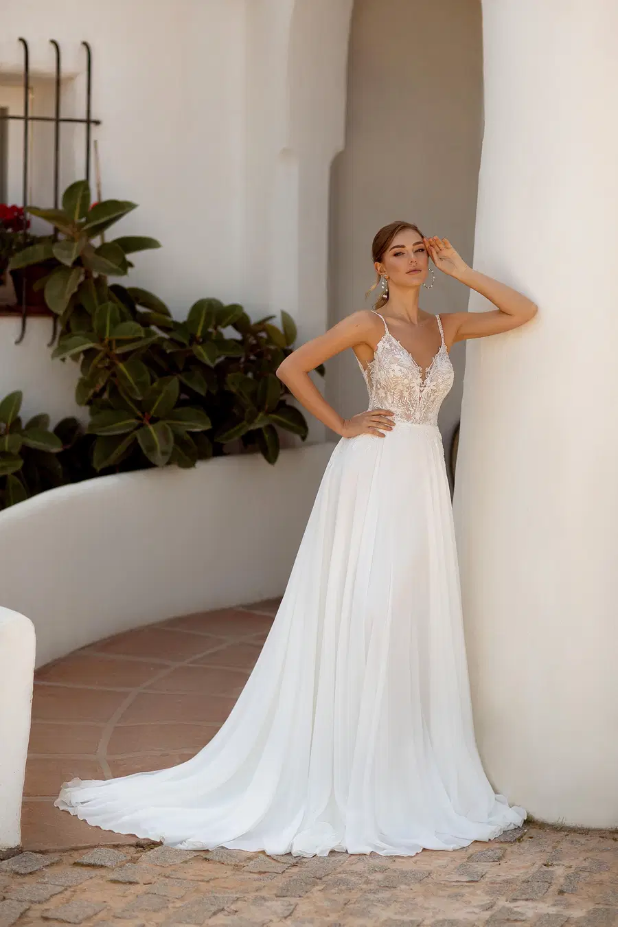 8228 by Monica Loretti: A-Line silhouette, V-neck neckline, chiffon