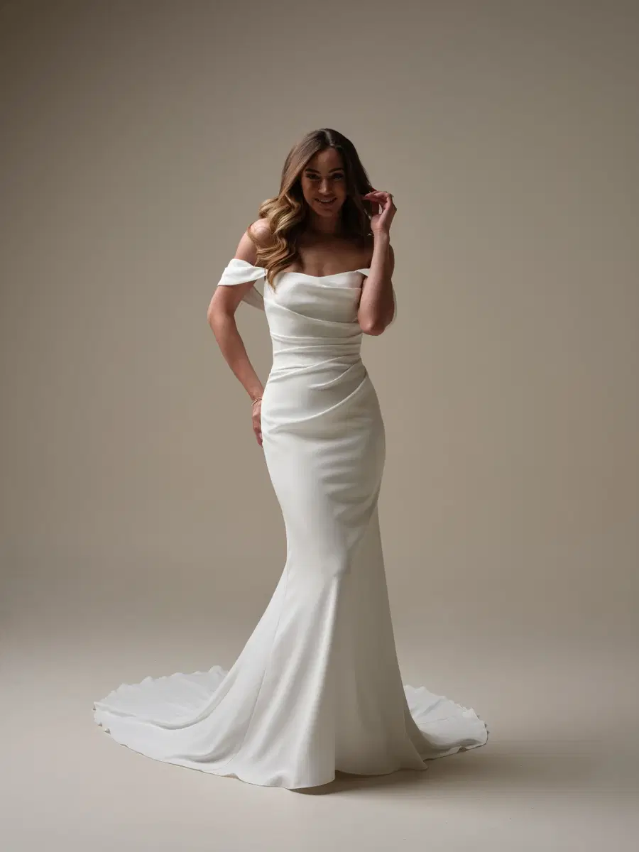 Denise by Rebecca Ingram: Fit & Flare silhouette, cat eye neckline, sleeveless, crepe