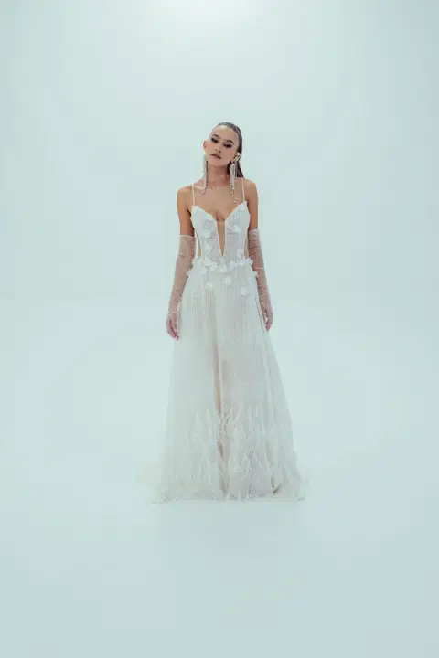 Feather wedding dress by Malee