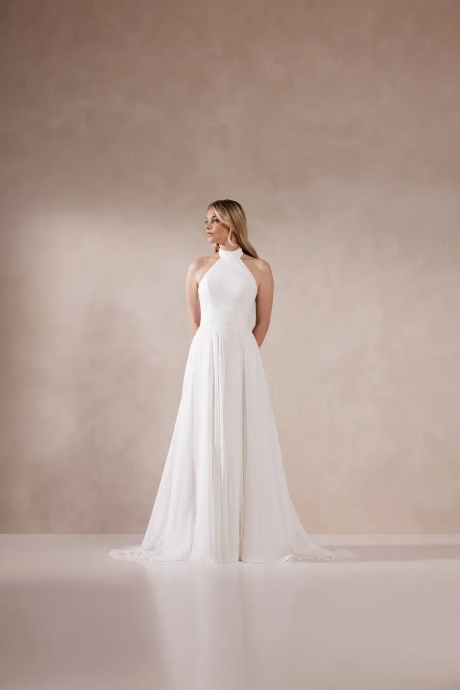 Uma by Adore: A-Line silhouette, high / halter neckline, chiffon