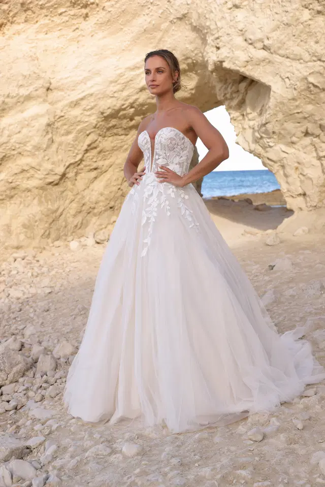 Astrid by Azuree Bridal: A-Line silhouette, deep V-neck neckline, lace