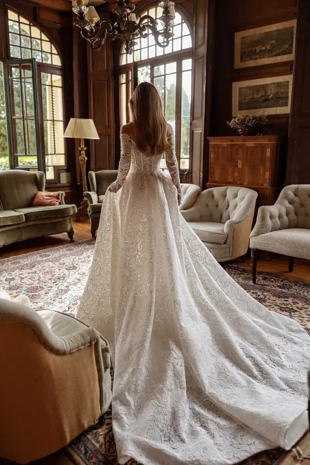 Bluebelle by Tina Valerdi: Ball Gown silhouette, deep V-neck neckline, long sleeves, lace